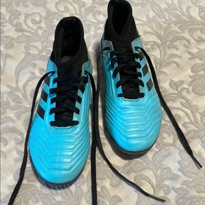 Blue and Black Soccer Cleats